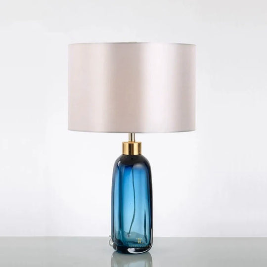 Iona Brushed Gold Blue Glass Table Lamp with Ivory Shade